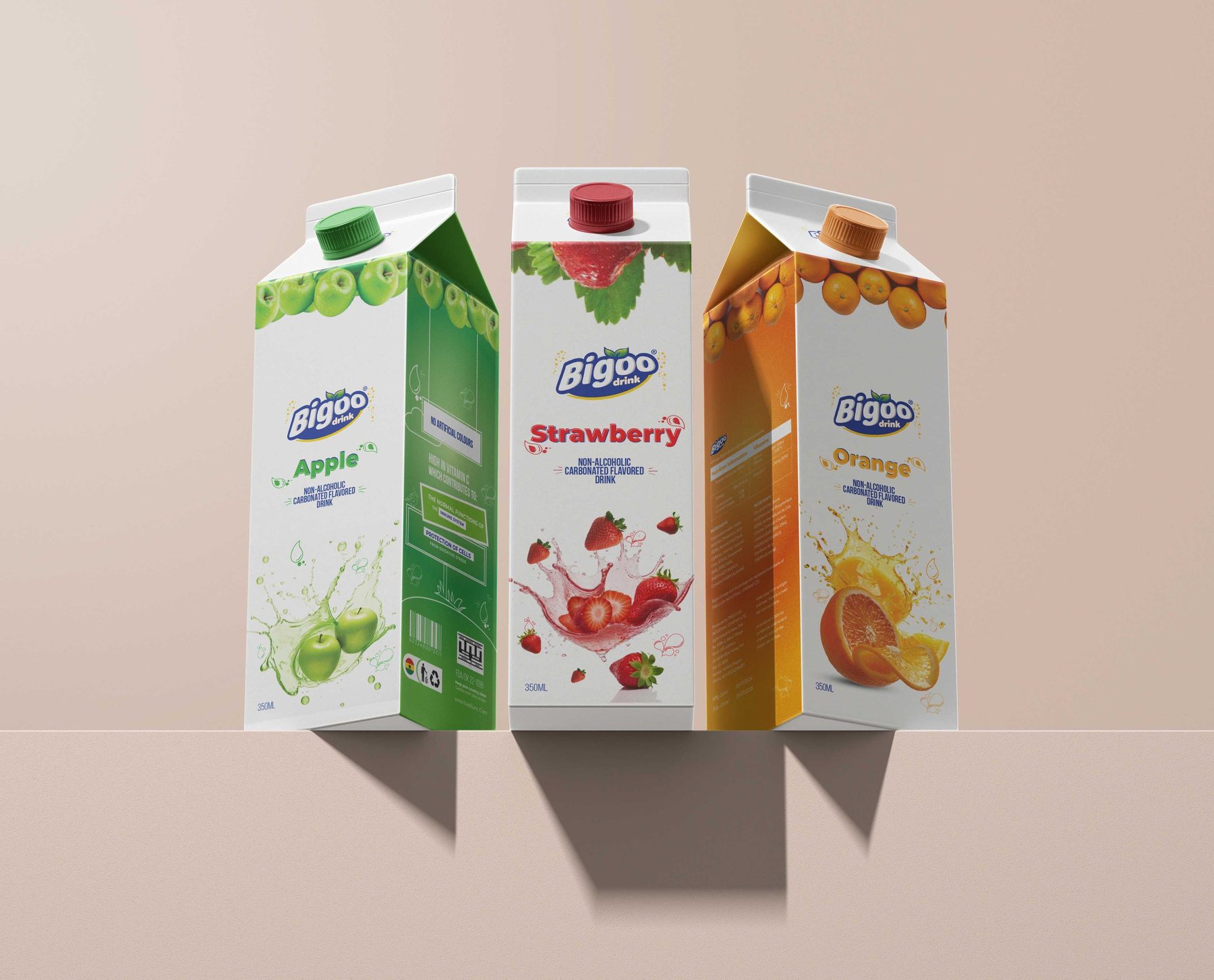 Three Bigoo juice cartons — apple, strawberry and orange — standing on a warm neutral set.
