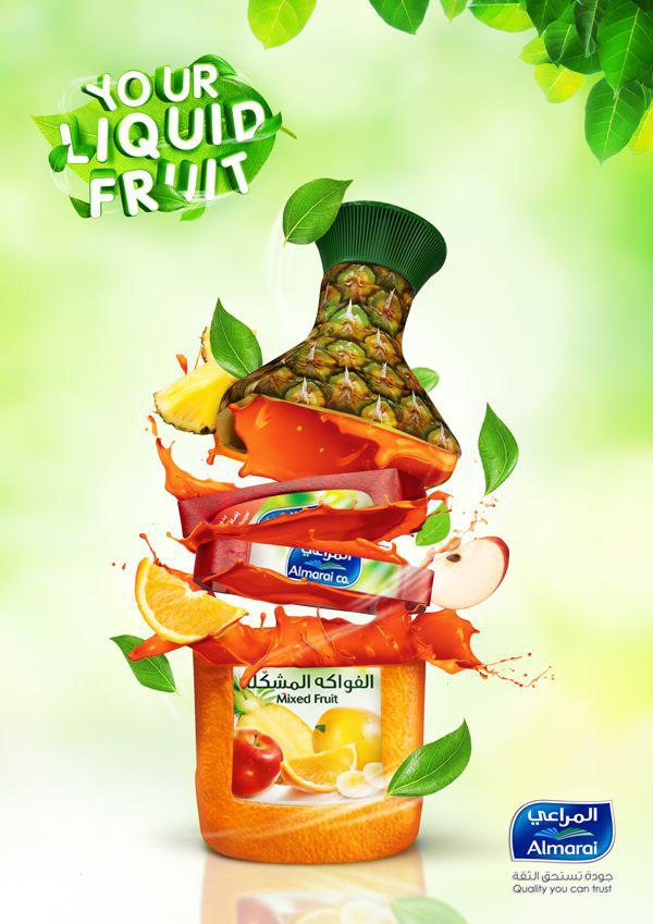 Almarai 'Your Liquid Fruit' advert — a juice bottle built from layered fruit and a splash of juice.